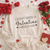 A sand coloured sweatshirt that says I dont need a valentine- funny humour valentine top