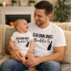 matching dad and baby tops that say Drinking buddies great gift for father days