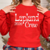 a red sweatshirt with lapland 2026 crew