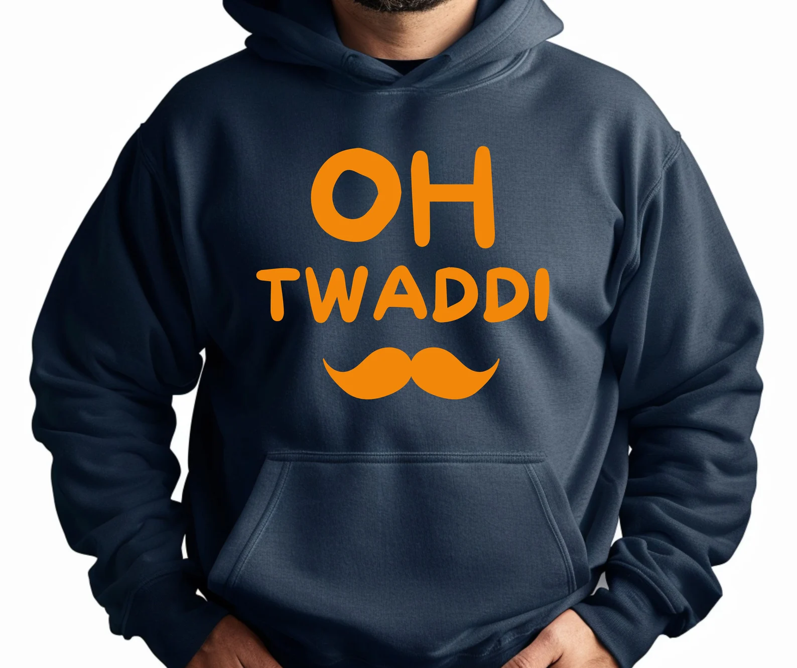 A person wearing a dark hoodie with bright orange text reading “OH TWADDI” and an orange mustache graphic printed beneath it. Punjabi Slogan