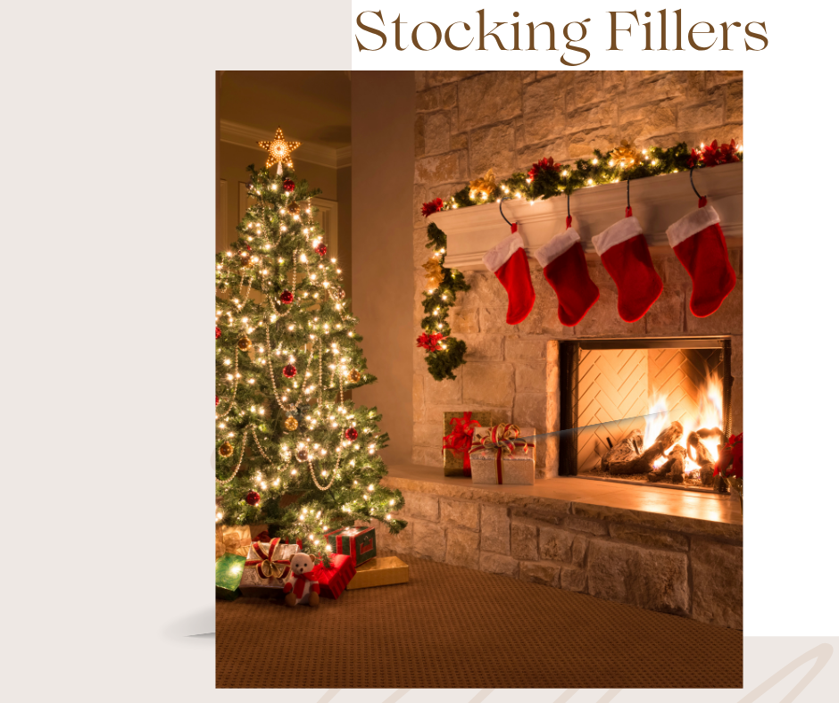 Christmas stockings displayed above a lit fireplace with a decorated Christmas tree, festive gifts and stocking filler inspiration for the holiday season.